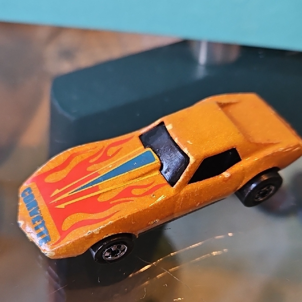 Hot Wheels Vintage 1975 Orange Corvette Stingray with Red, Blue and Yellow Decal